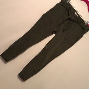 Pants with slits lower bottom on leg.